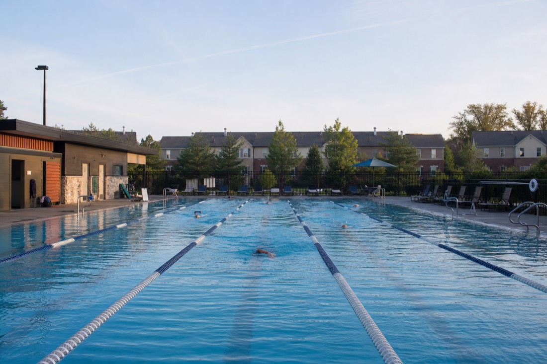 Swimmers doing quiet morning lengths in a residential Budapest bath complex